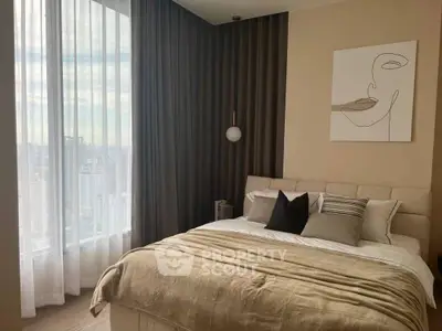 Modern bedroom with large window and stylish decor in high-rise apartment.