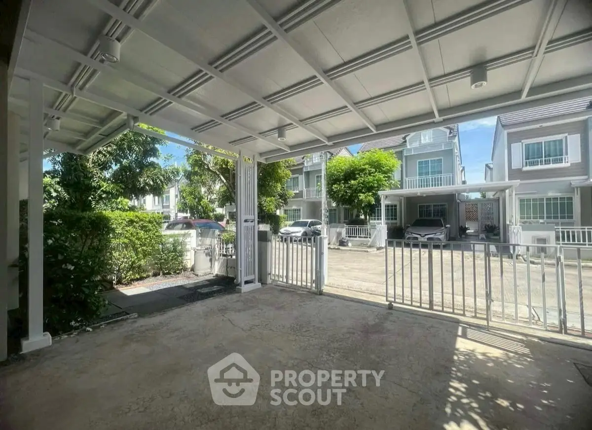 Spacious covered parking area in a modern residential neighborhood