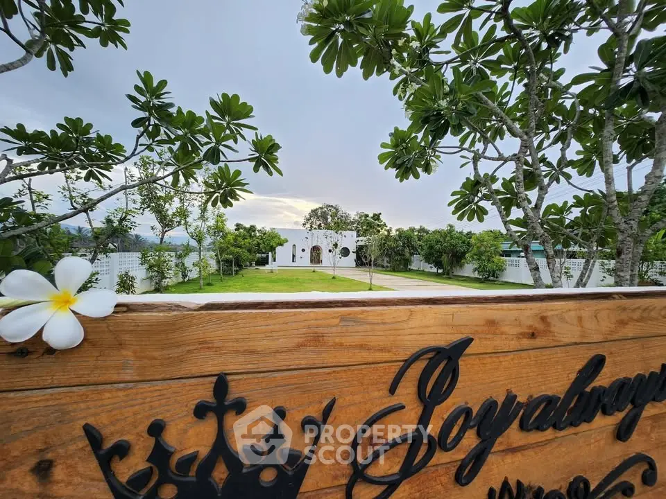 Charming villa with lush garden and scenic views, perfect for tranquil living.