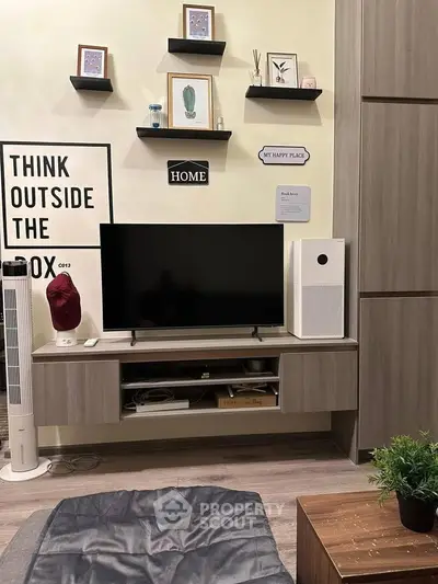 Modern living room with stylish decor and entertainment setup
