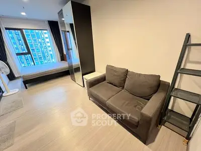 Modern apartment interior with cozy living room and bedroom view