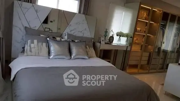 Luxurious bedroom with elegant decor and spacious walk-in closet