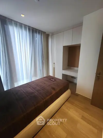 Modern bedroom with sleek design and natural light