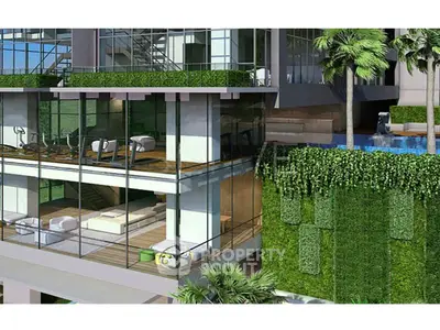Luxurious modern building with glass facade, gym, and pool surrounded by lush greenery.
