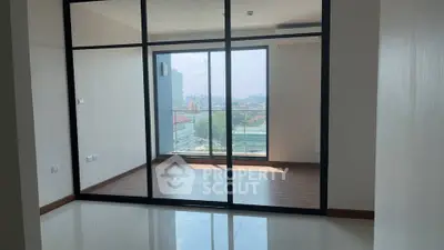 Spacious modern apartment with floor-to-ceiling windows and city view