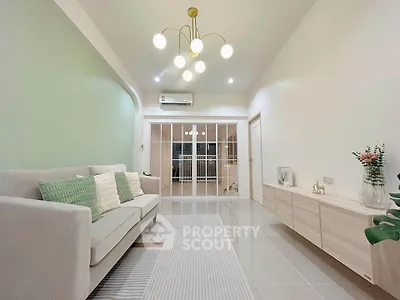 Modern living room with elegant lighting and stylish decor