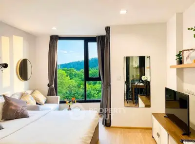 Modern bedroom with scenic view, featuring cozy seating and stylish decor.