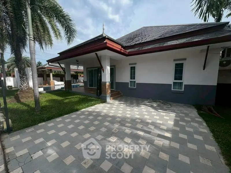 Charming single-story home with spacious patio and lush garden