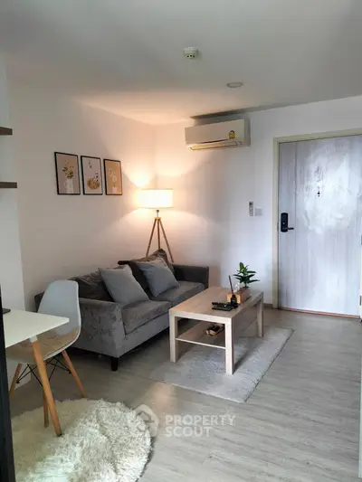 Cozy modern living room with stylish decor and natural lighting