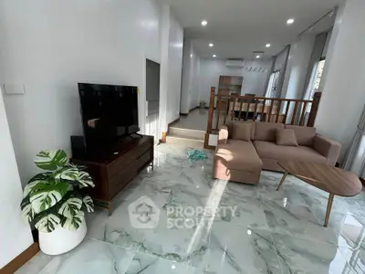 Spacious modern living room with stylish furniture and natural light