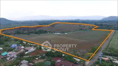 Expansive aerial view of prime real estate land with clear boundary markings, ideal for development.