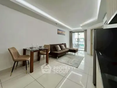 Modern living room with sleek furniture and balcony view in a stylish apartment.