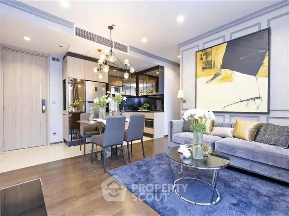 Luxurious modern living room with elegant decor and open kitchen layout