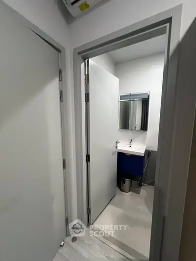 Compact bathroom with modern fixtures and sleek design