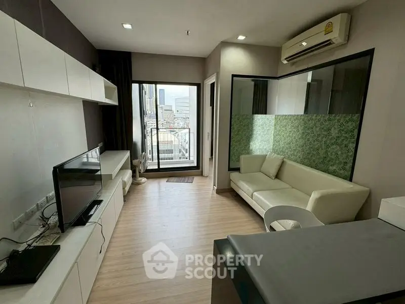 Modern living room with balcony view in urban apartment