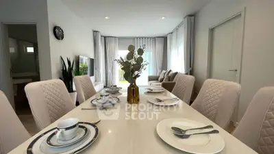 Elegant dining area with modern decor and natural light in a stylish apartment.