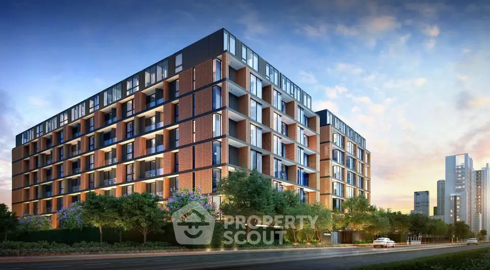 Modern apartment building with sleek design and lush greenery in urban setting.