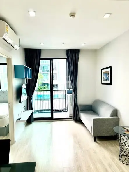 Modern living room with balcony view in a stylish apartment