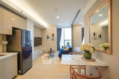 Modern open-plan living area with stylish kitchen and cozy seating.