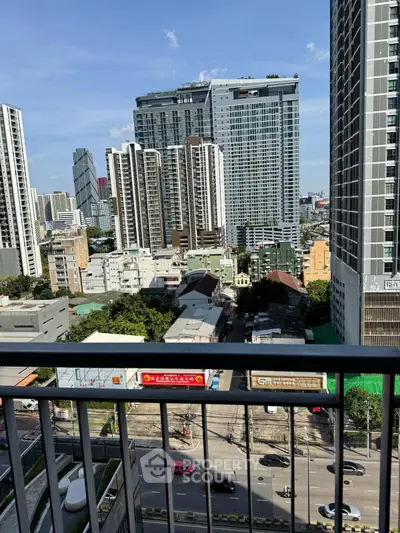 Stunning cityscape view from high-rise balcony in urban setting