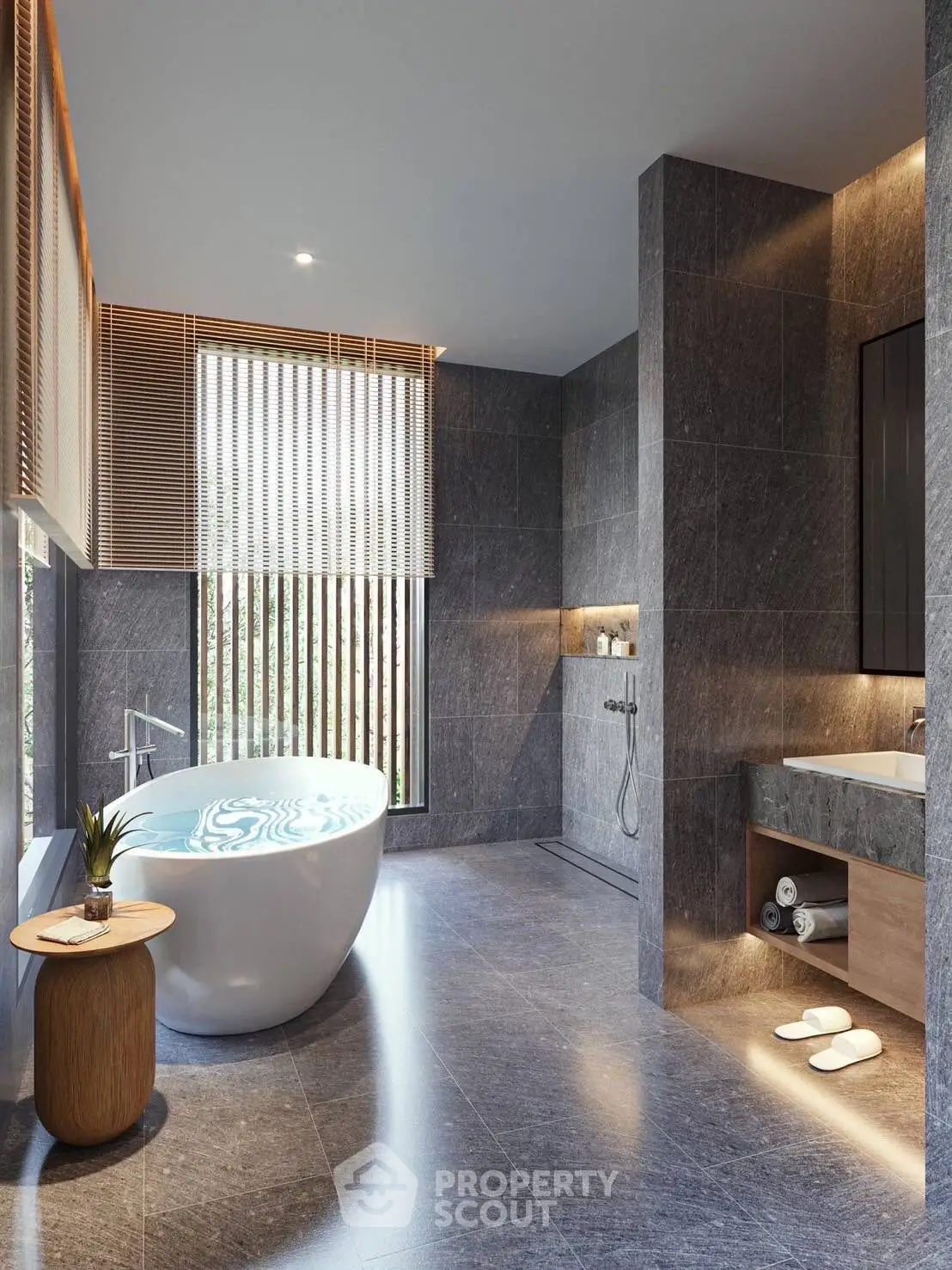 Luxurious modern bathroom with freestanding bathtub and elegant stone tiles.