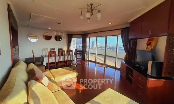 Spacious living room with panoramic city view and elegant furnishings
