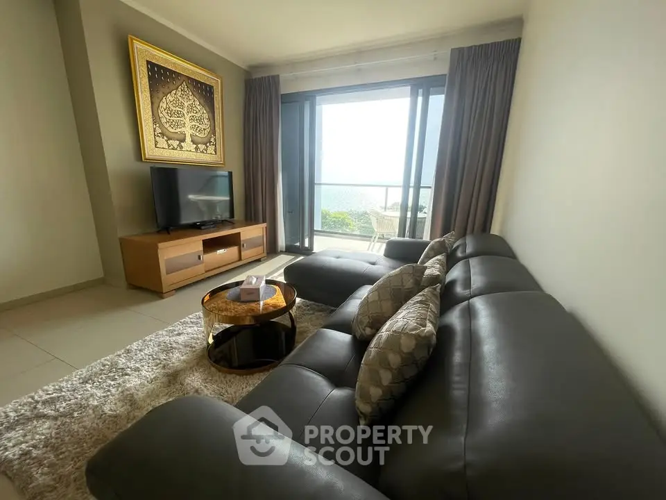 Luxurious living room with stunning sea view and elegant decor