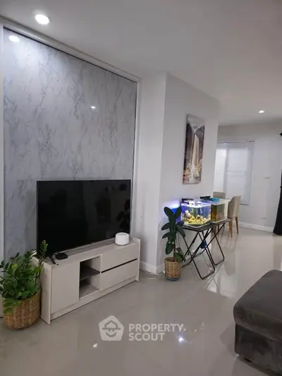 Modern living room with sleek TV setup and stylish decor