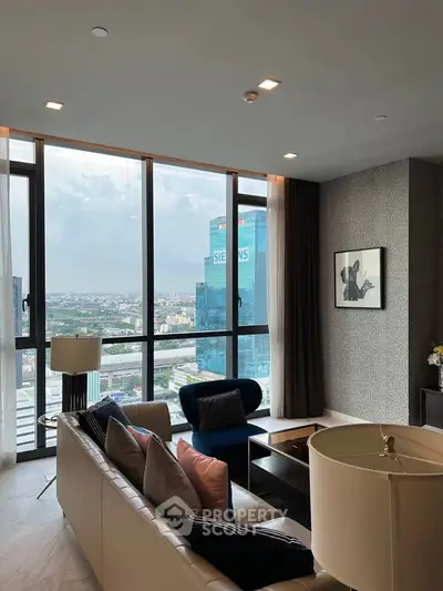 Luxurious living room with panoramic city view and modern decor.