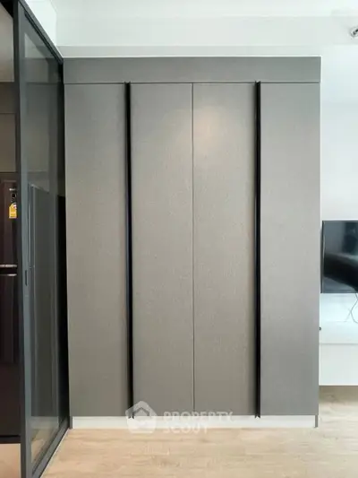 Modern living room with sleek design and wooden flooring