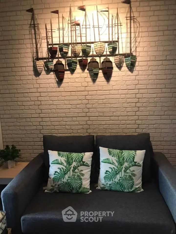 Cozy living room with stylish decor and comfortable seating, perfect for relaxation.