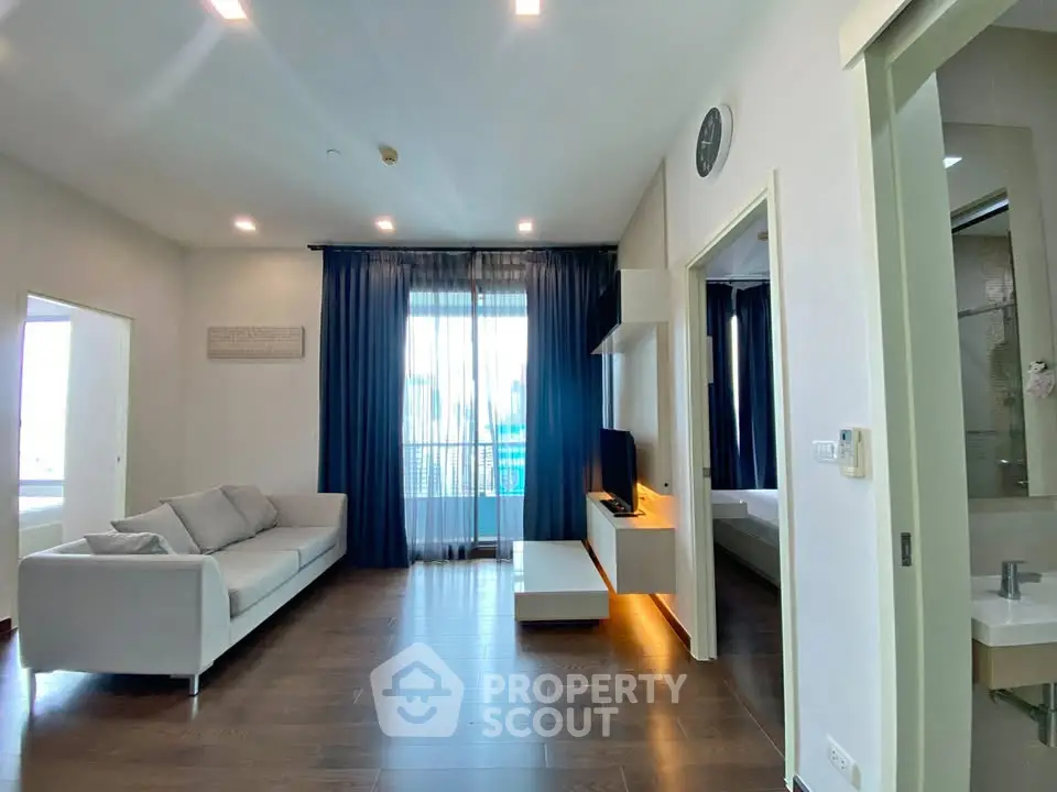 Modern living room with sleek design and natural light