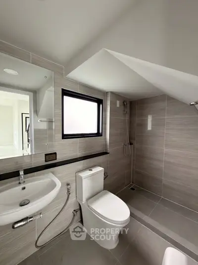 Modern bathroom with sleek design and natural light