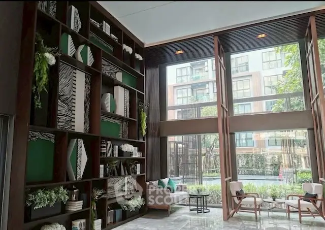 Luxurious modern living room with high ceilings and large windows overlooking garden