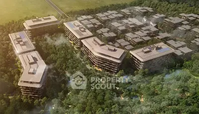 Aerial view of modern residential complex surrounded by lush greenery and scenic landscape.