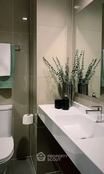 Modern bathroom with sleek fixtures and elegant decor