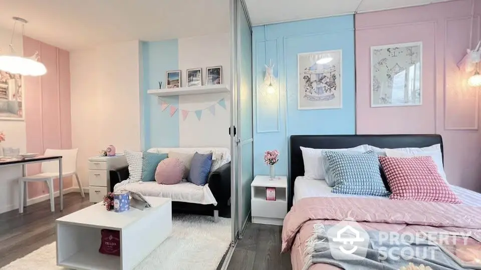 Charming studio apartment with pastel decor and cozy furnishings