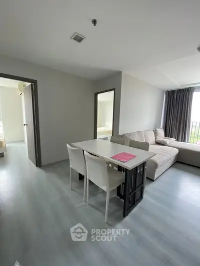 Modern living room with sleek furniture and natural light