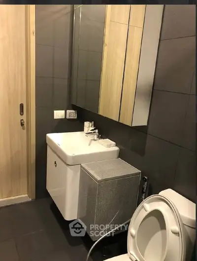 Modern bathroom with sleek fixtures and contemporary design.