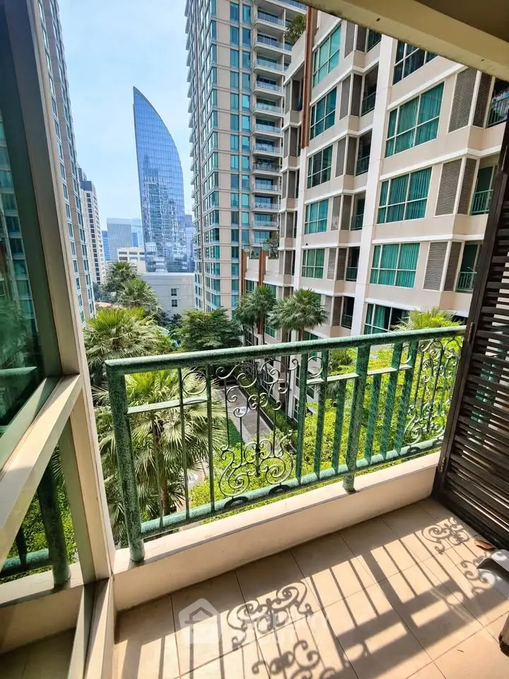 Charming balcony with city view in modern high-rise building
