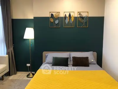 Cozy bedroom with stylish decor and modern lighting