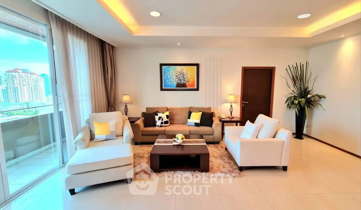 Spacious and elegant living room with modern decor and city view