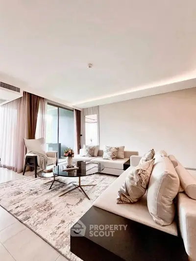 Elegant living room with modern decor and natural light