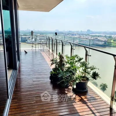 Stunning balcony with river view and lush plants in modern apartment