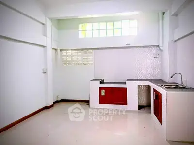 Spacious kitchen with modern design and ample natural light