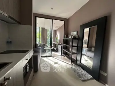 Modern living room with large mirror and natural light