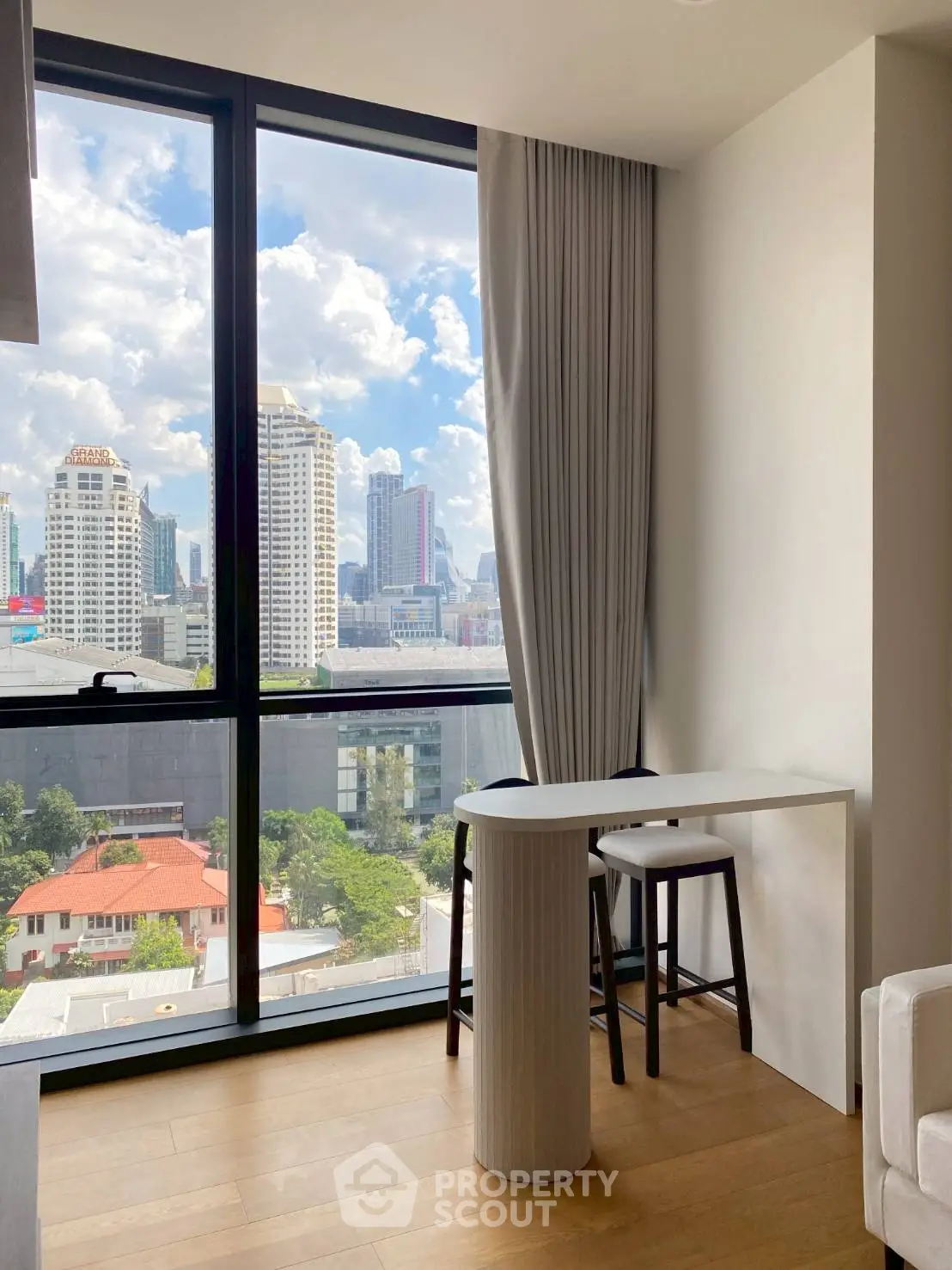 Modern apartment with stunning city view and elegant interior design