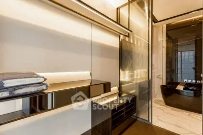 Luxurious modern bathroom with sleek black fixtures and elegant marble accents.