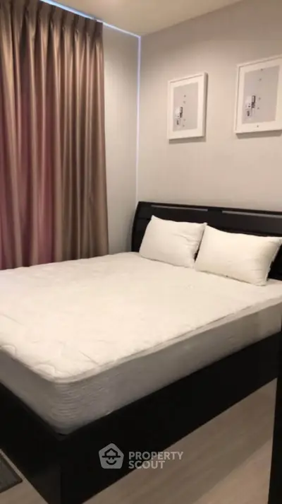 Cozy bedroom with modern decor and comfortable bed in a stylish apartment.