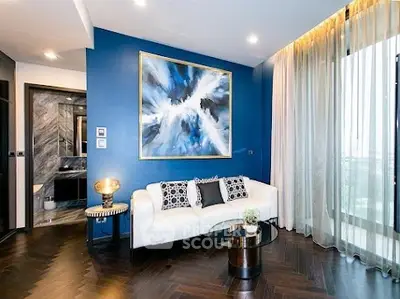 Luxurious living room with modern decor and stunning artwork